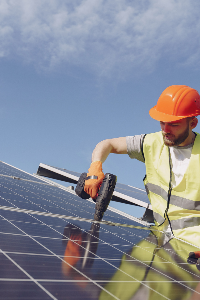 engineer installing solar panels